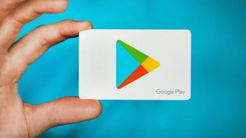 Hand Holding Google Play Logo White Card
